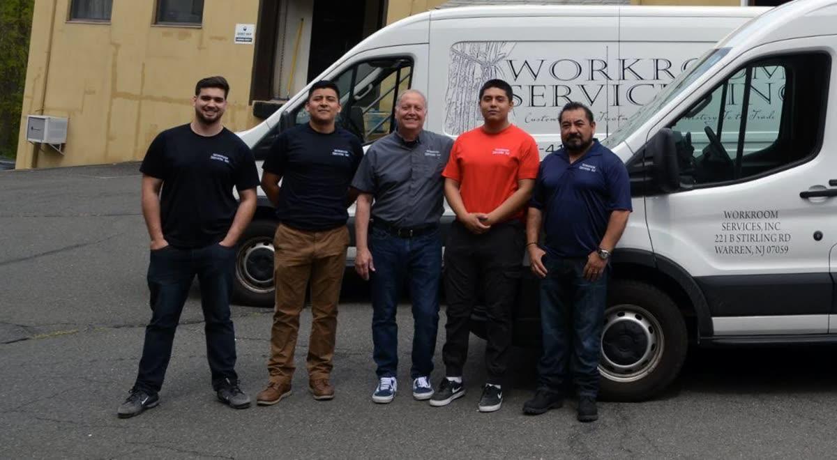 Workroom Services installation team beside its service vehicle in New Jersey