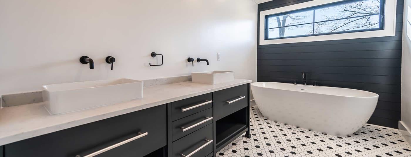 Prominent Builders custom bathroom with freestanding soaking tub