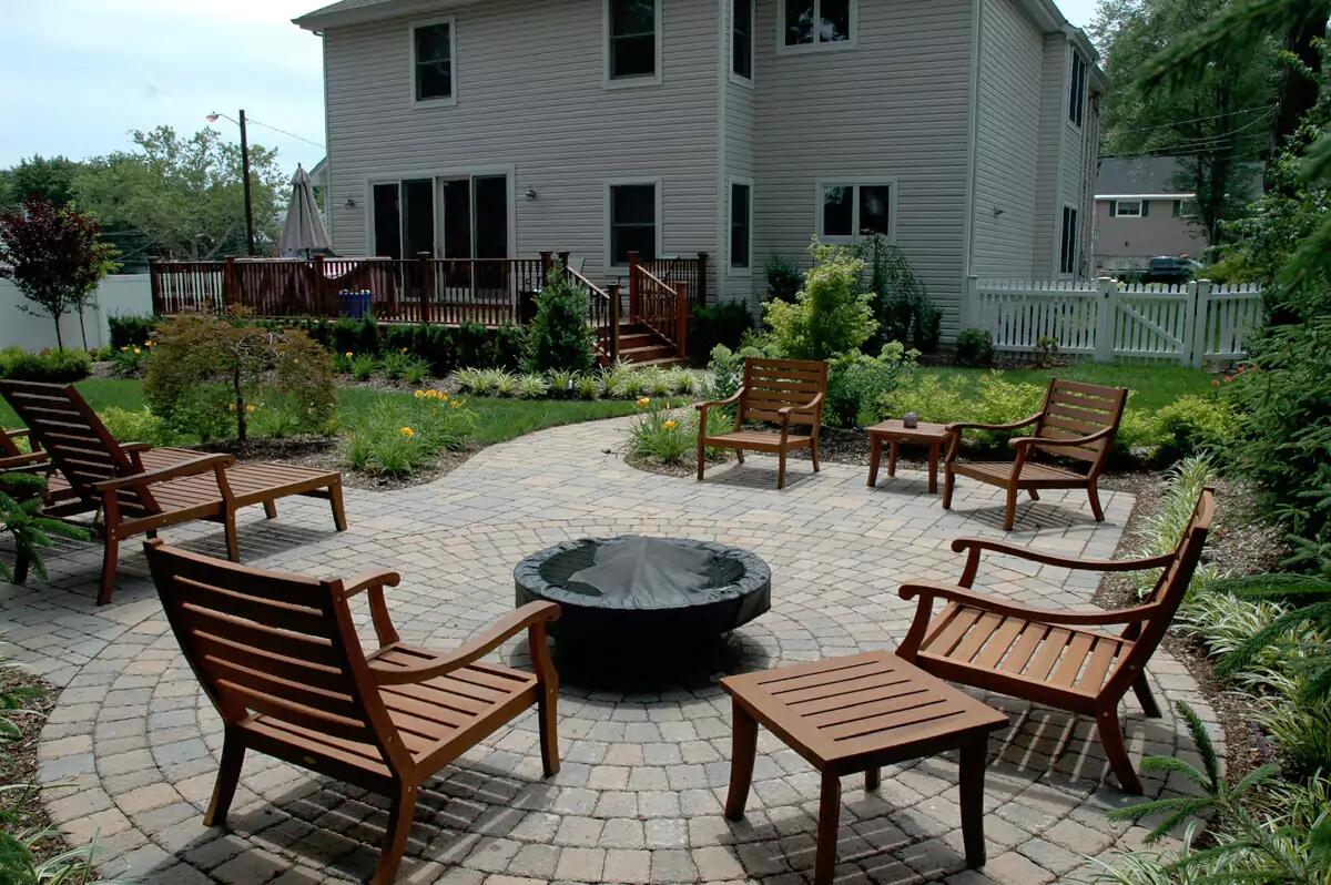 Fire pit and outdoor grill area designed and built by Terracare Landscaping for luxury residential property in Northern New Jersey
